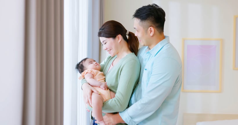 Young parent hug with child