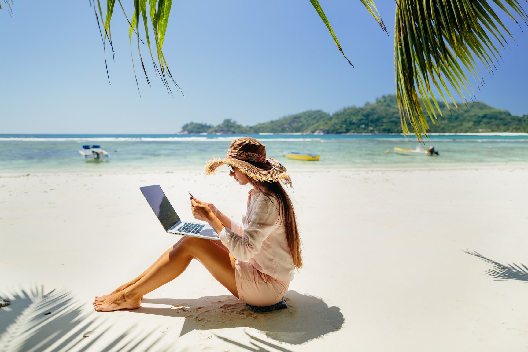 Woman Freelancer on the Beach